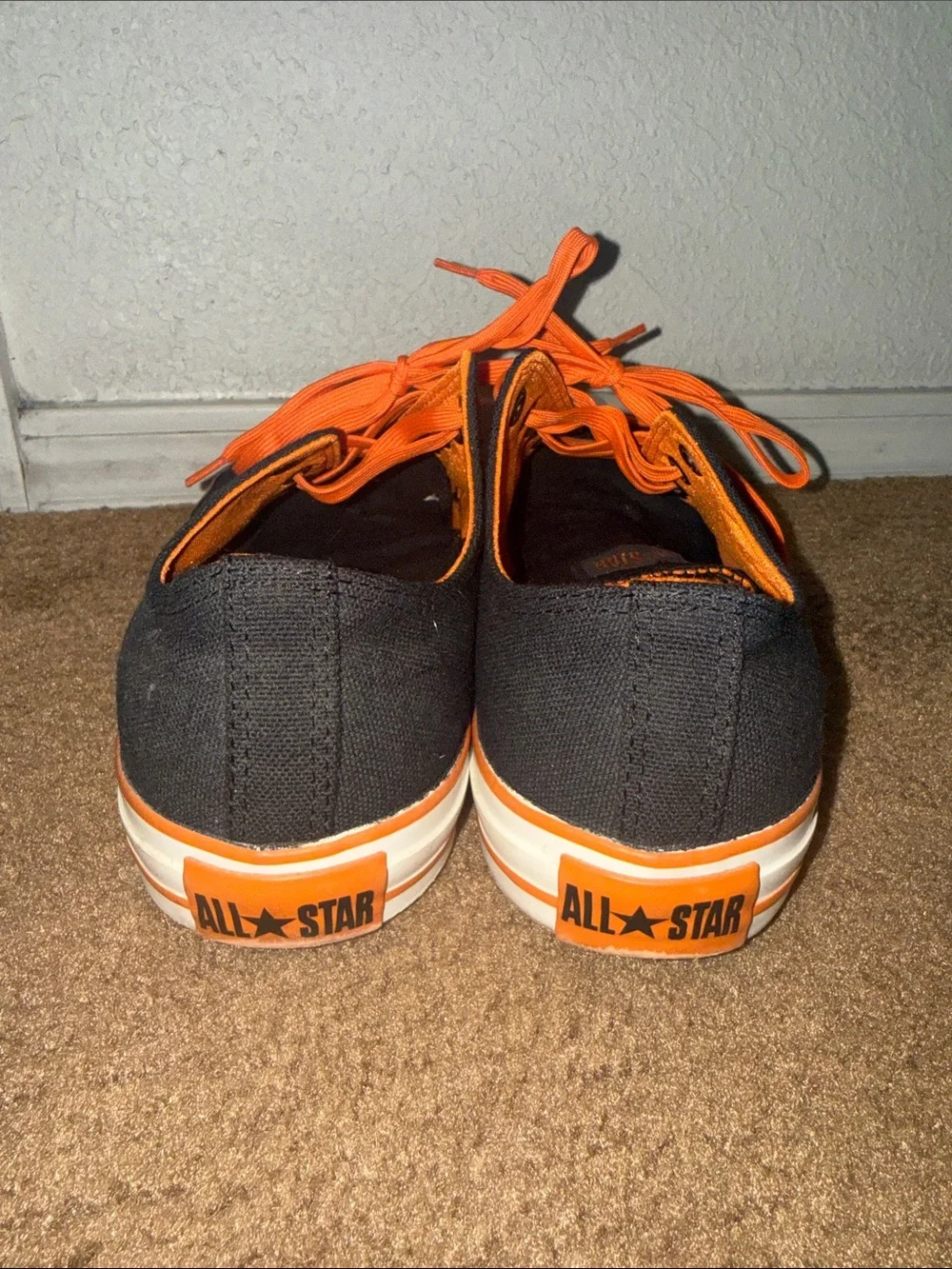 Converse Black Canvas Low-Top Sneakers with Bright Orange Laces